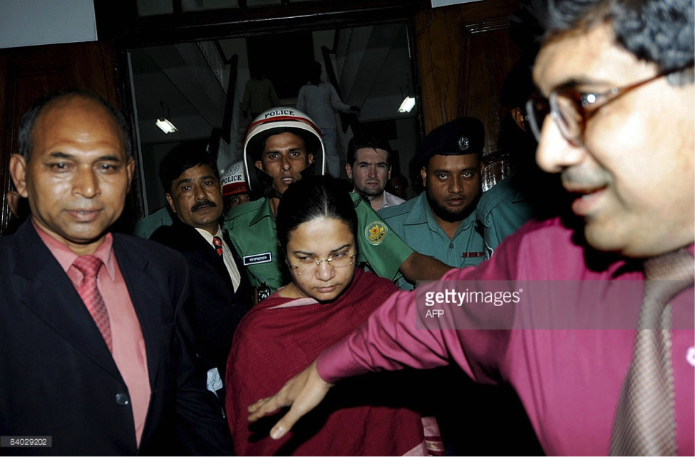 Bangladeshi United Kingdom resident Dr. Humayra Abedin (C) leaves under escort following a verdict in the Bangladesh High court on December 14, 2008. A Bangladeshi doctor whose parents were accused of holding her captive in the capital Dhaka for more than four months is free to return to her home in Britain, a court ruled. Judge Syed Mahmod Hossain ordered Humayra Abedin's parents to return her passport, driver's licence and credit card. AFP PHOTO/Munir Uz Zaman