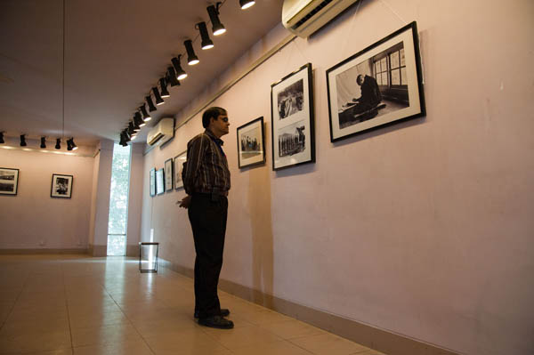 Police personnel visit the exhibition about Tibet at Drik galler