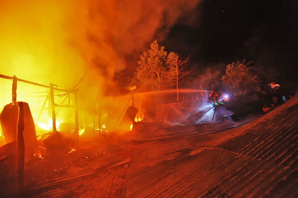 Once they received the message, the fire brigade was quick to respond. Photo: Shahidul Alam/Drik/Majority World