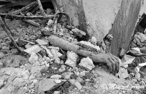 The price of greed. A dismembered hand at wreckage of Rana Plaza, a building which collapsed on 24th April in Savar Bangladesh, killing many. Photo Monirul Islam