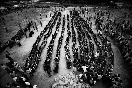 Queue outside a food distribution centre in Maheshkhali in Chittagong District after the devastating cyclone in 1991. ? Shahidul Alam/Drik/Majority World