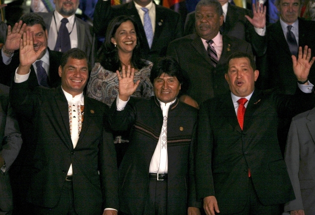 October 16, 2009: At the Seventh Summit of the Bolivarian Alternative for the Americas. Front row, from left: Bolivia's President Evo Morales, Ecuador's President Rafael Correa and Venezuela's President Hugo Chavez. Second row, from left: St. Vincent and the Grenadines' Prime Minister Ralph Gonsalves, Foreign Affairs Minister in Honduras' ousted Manuel Zelaya government Patricia Rodas, Antigua and Barbuda's Prime Minister Winston Baldwin Spencer and Uruguay's Ambassador to Bolivia Diego Zorrilla. Photo:Dado Galdieri/AP