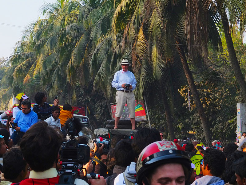 Rupert Grey on the rooftop of his 1936 Rolls Royce which he drove across to Bangladesh for Chobi Mela VII