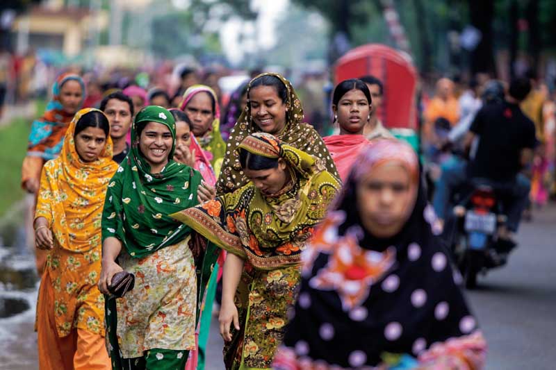 Off to work, Mirpur, Dhaka. September 12, 2012. Photo ? AM Ahad