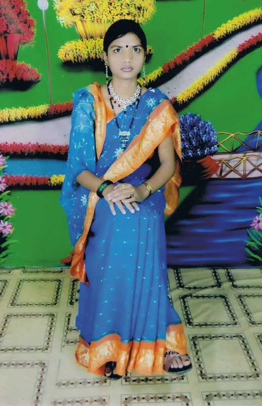 Studio portrait of Sumaya, barely sixteen, and employed at Tazreen Fashions in Nischintapur. Ashulia, Dhaka. Early-2012. Photo ? Ratna studio, Nischintapur