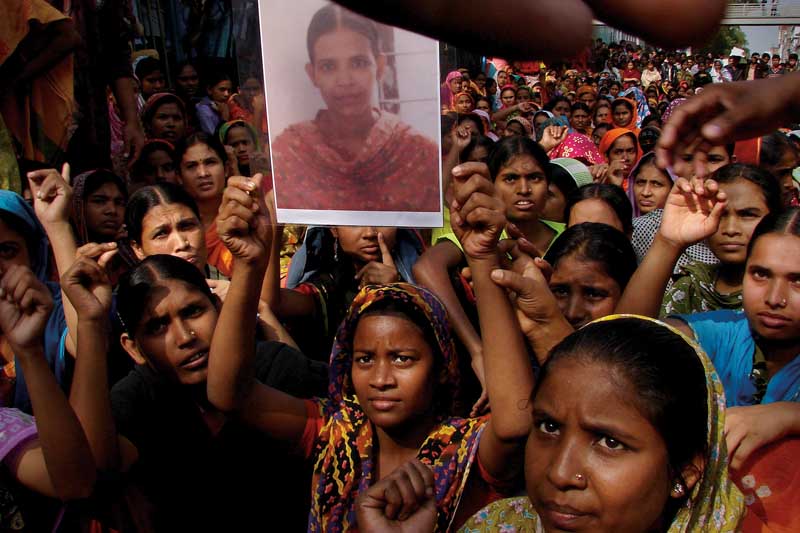 Garment workers demonstrate after the death of Salma, a fellow worker, Shewrapara, Dhaka. January 15, 2008. Photo ? Taslima Akhter