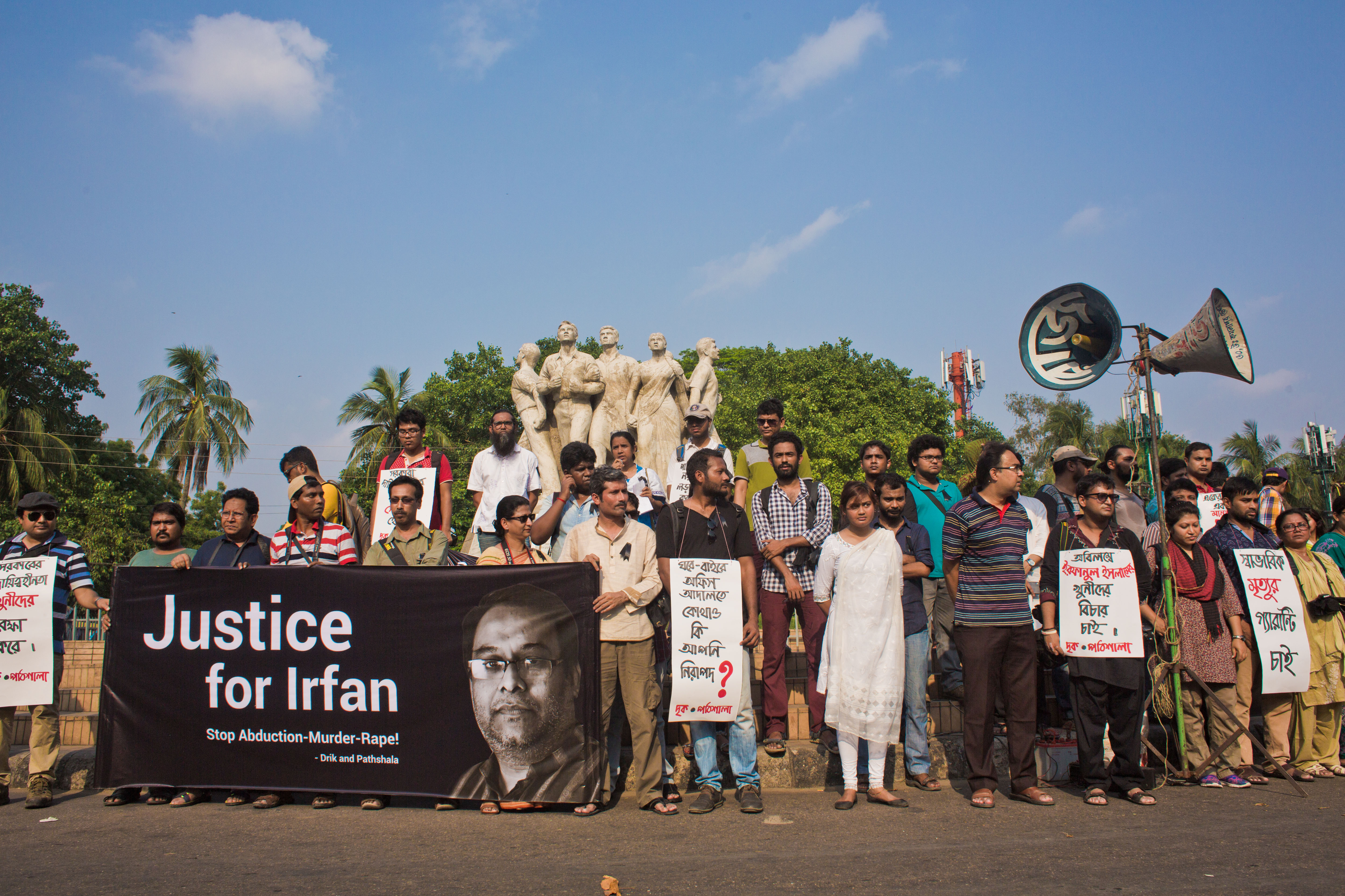 Photojournalists stage a protest in front of Dhaka University's Raju Bhashkorjo, April 9, 2016. ?Habibul Haque